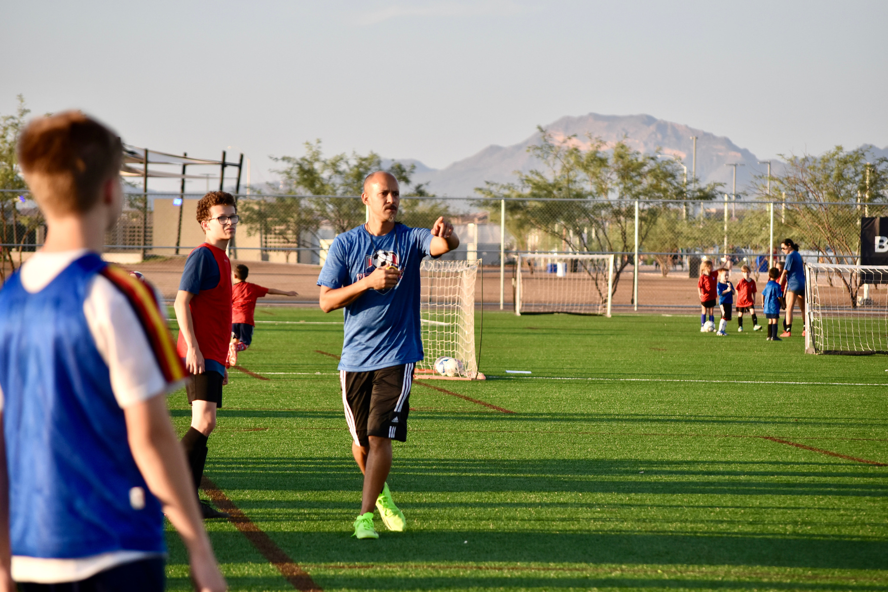 Coach Tyrone instructing youth soccer players in Mesa, Arizona
Coaching soccer East Valley Arizona